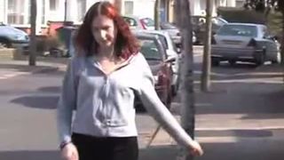 Redhead babe peeing in public