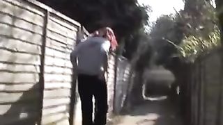 Redhead babe peeing in public