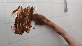 Blonde babe smears shit on her face