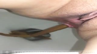 Close up of sexy housewife pooping