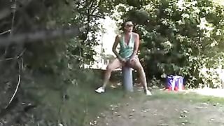 Beautiful girl peeing outdoor