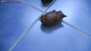 Huge brown turd from her tight butthole