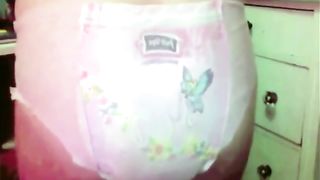 Filled pink diapers with poop
