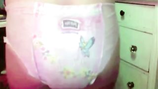 Filled pink diapers with poop