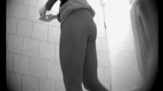 Blonde babe shitting over toilet