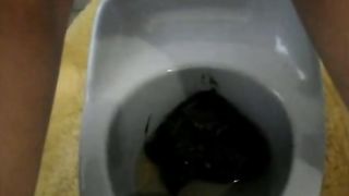 Same woman shitting in potty