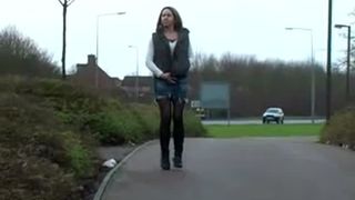 Sexy babe peeing on sidewalk