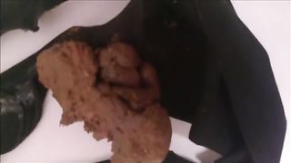 Beautiful babe shits in black panties