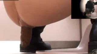 18 year old Asian girl using a public bathroom