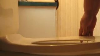 Fat granny shitting in toilet