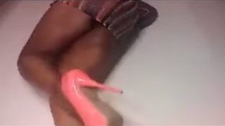 Black girl shitting in fishnet outfit
