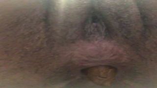 Shaved girl shitting in toilet