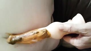 Pooping on a buttplug