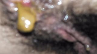 Hairy babe shitting in real close up