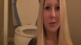 Blonde babe pooping in toilet