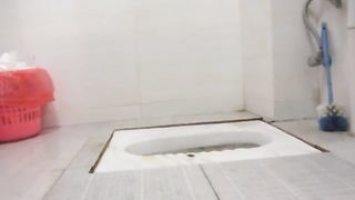 Chinese girl wiping her ass
