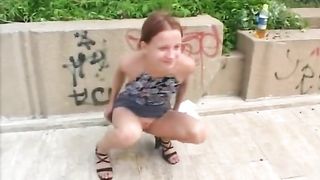 Skinny girl peeing in public