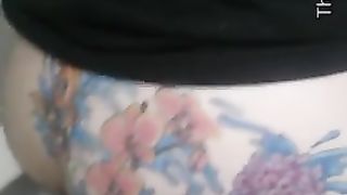 Girl with tattooed ass pooping