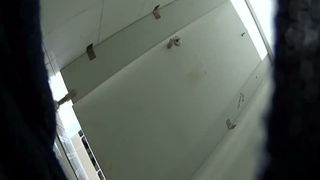 Spying on a curvy babe shitting