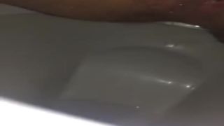 Sexy wife shitting in toilet