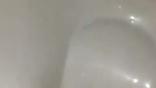 Sexy wife shitting in toilet
