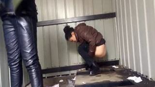 Dark haired teen shitting