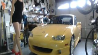 Smoking hot blonde shitting in a garage