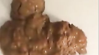 Hot Japanese girl shitting in public bathroom