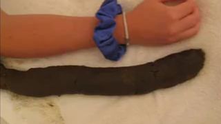 Giving brith to a very long turd