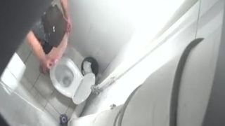 Blonde babe using a public bathroom