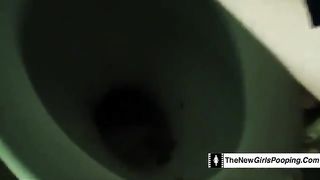 Brunette college teen shitting