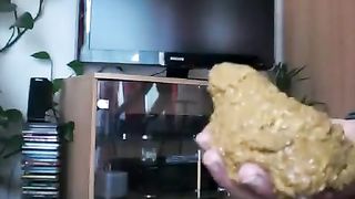 Shitting on her hands