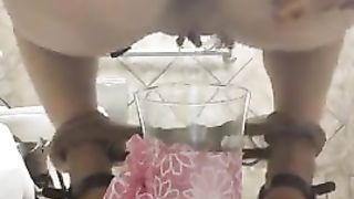 Hot brunette shitting in public restroom