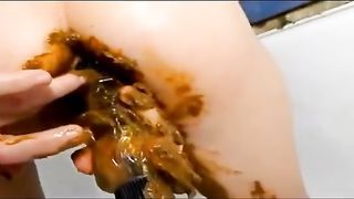 Hardcore scat masturbation with a young girl