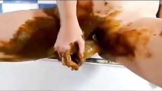 Hardcore scat masturbation with a young girl