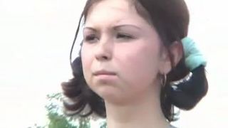 Petite girl peeing outdoor