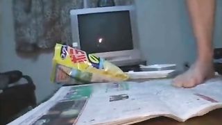 Japanese girl pooping on a newspaper