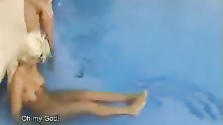 Two girls shitting in a public pool