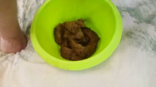 Blonde babe smears shit on her long hair