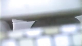 Spying on a mature woman that's pooping