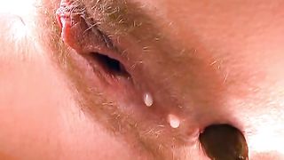 Hairy milf pooping in close up