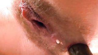 Hairy milf pooping in close up