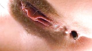 Hairy milf pooping in close up