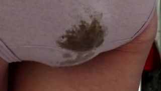 Turd in grey panties