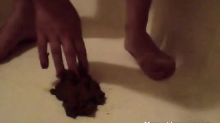 Chubby brunette pooping in bathtub