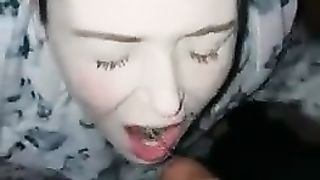 Peeing in her opened mouth