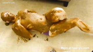 Bald girl masturbating with a lot of poop