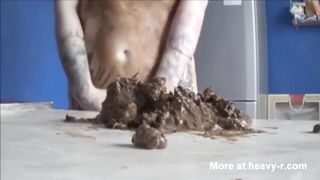 Incredible redhead girl smears shit
