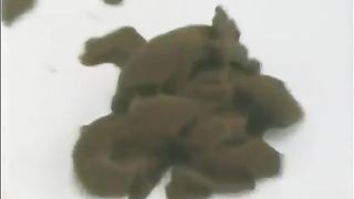 Blonde babe trying to poop in her panties