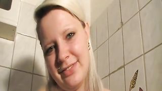 Smearing shit on dildo before riding it
